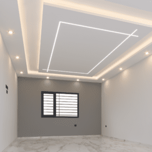 Faux plafond élégant avec double niveau d'éclairage LED intégré et design structuré moderne.