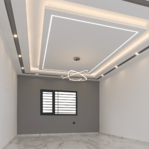 Faux plafond moderne avec éclairage indirect intégré dans un salon tendance.